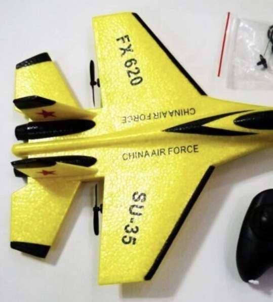Радиоуправляемая, детская игрушка - самолет с пультом в фото 16