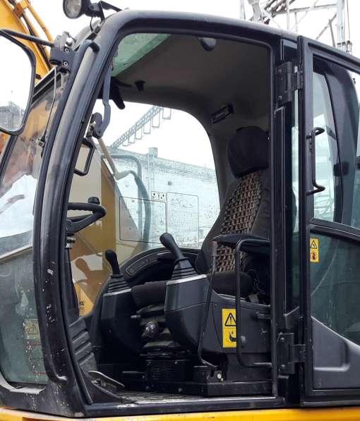 Колесный экскаватор JCB JS160W, 2010 г. в в фото 5