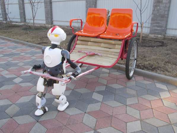 Идея для бизнеса - аттракцион, электромобиль Робот Рикша в Москве фото 5