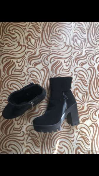 Пуховик и ботильоны в Москве