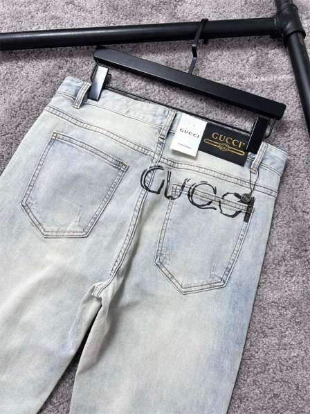 Gucci новые джинсы 32 размер