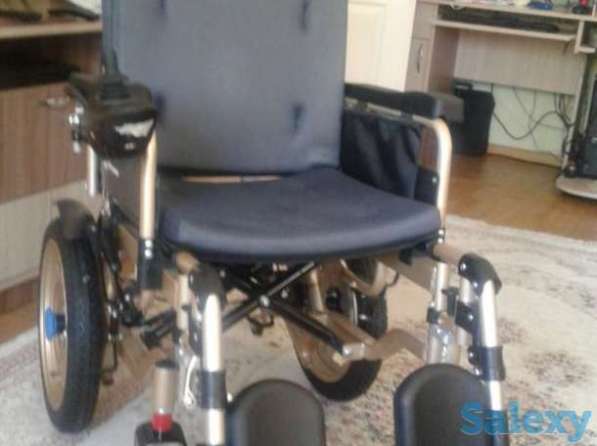Инвалидная коляска с электроприводом в фото 5
