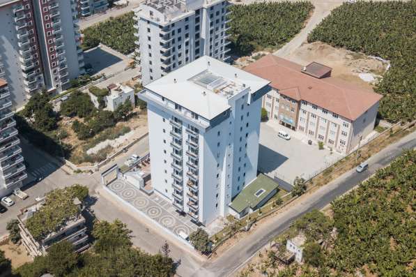 Новые квартиры 1+1 в новом комплексе. Турция/Махмутлар в фото 9